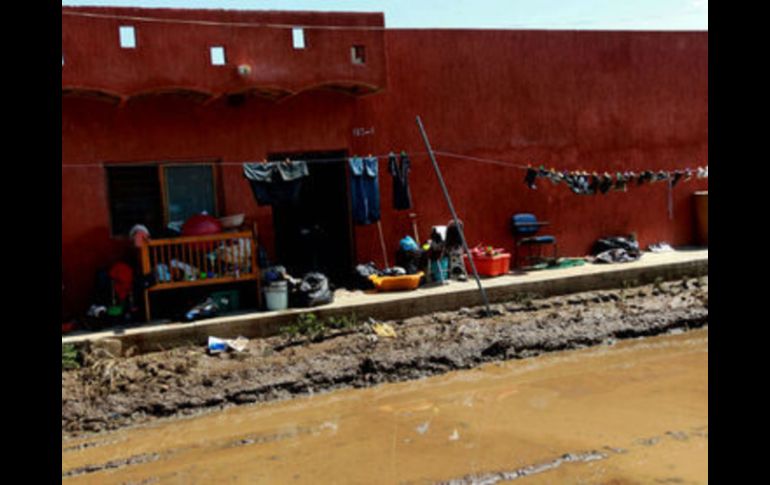 Los trabajo de limpieza y rehabilitación de calles e infraestructura hidrosanitaria continúan en la zona afectada. ARCHIVO /