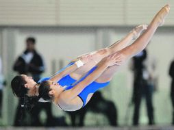 Alejandra Orozco (al frente) y Paola Espinosa aseguraron el boleto para la competencia que se realizará del 19 de julio al 4 de agosto. MEXSPORT /