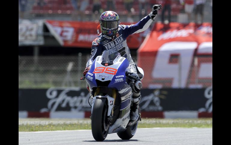 Jorge Lorenzo de Yamaha triunfa por tercera vez en la temporada. AFP /