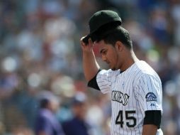 El abridor venezolano Jhoulys Chacín, de los Rockies, queda a sólo un out de conseguir su segunda blanqueada de por vida. AFP /