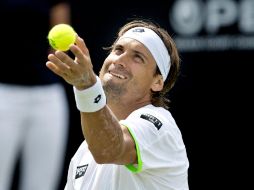 Malisse rompe cuatro veces el saque de David para echarlo del torneo. AFP /