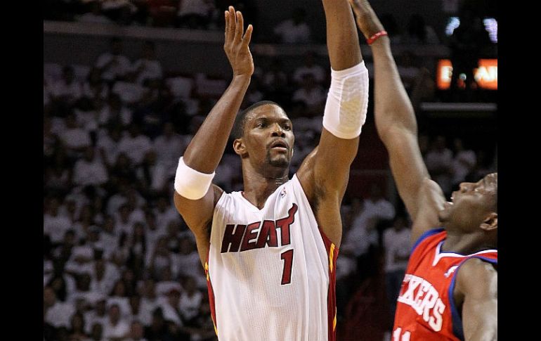 El pívot de los Heat de Miami Chris Bosh dice que no permitirá que el escolta Danny Green, de los Spurs, vuelva a ser factor ganador. ARCHIVO /