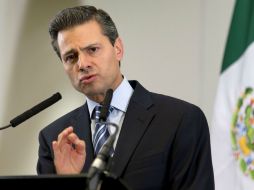 Enrique Peña Nieto anuncia en la cumbre del G-8 que el Pacto explora la inversión privada en Pemex. AFP /