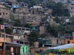 Las casas fueron abandonadas por sus propietarios debido a las amenazas de muerte de los pandilleros. ARCHIVO /