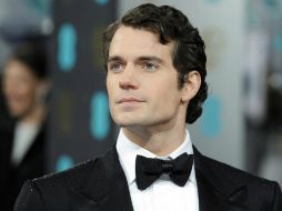 La autora de la trilogía nunca ha ocultado su deseo de que sea Henry Cavill quien interprete a Christian Grey. ARCHIVO /