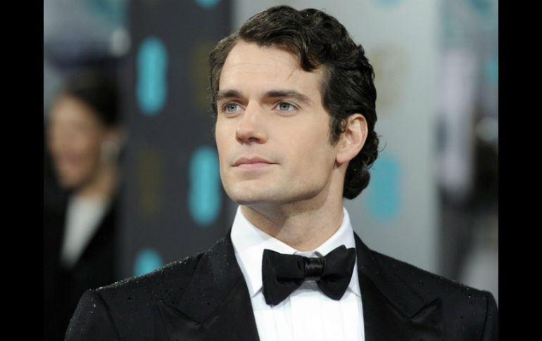 La autora de la trilogía nunca ha ocultado su deseo de que sea Henry Cavill quien interprete a Christian Grey. ARCHIVO /