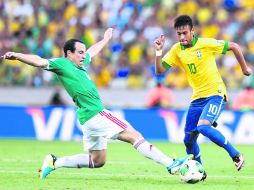 Gerardo Torrado aporta entrega y experiencia en el medio campo tricolor, pero no tiene la capacidad para surtir a los atacantes. AP /