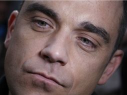 Robbie Williams precisó que sus días de excesos forman parte del pasado. ARCHIVO /