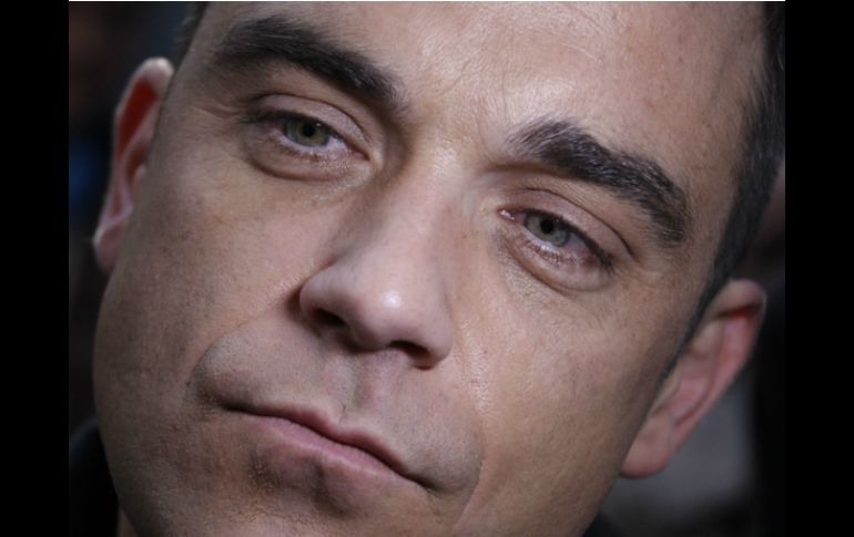 Robbie Williams precisó que sus días de excesos forman parte del pasado. ARCHIVO /