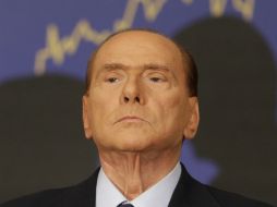 ''Soy completamente inocente y no quiero abandonar mi batalla para hacer de Italia un país libre y justo'', dijo Berlusconi. AP /