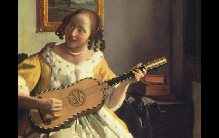 ''La guitarrista'' de Vermeer deleita en Londres con su composición inusual. ARCHIVO /