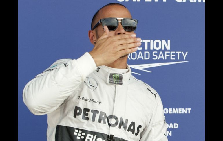 Lewis apunta que gracias al trabajo de su equipo y la 'pole' obtenida es una gran recompensa para su esfuerzo. AFP /