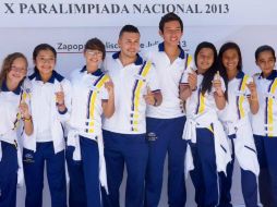 Ellos son algunos de los atletas que participaron en la ceremonia. ESPECIAL /