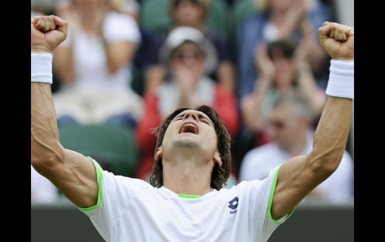 David Ferrer celebra la victoria obtenida ante Ivan Dodig. EFE /