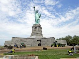 Centenares de trabajadores realizaron labores para restaurar los daños ocasionados por ''Sandy''. AP /