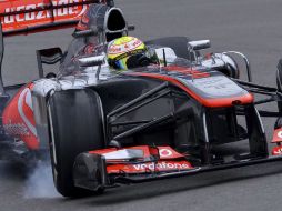 El piloto mexicano de Fórmula Uno Sergio Pérez, de McLaren Mercedes, durante la sesión de entrenamientos libres en el circuito germano. EFE /