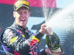 La imagen más cotidiana en la F1 durante las últimas cuatro temporadas es la del festejo por todo lo alto de Sebastian Vettel. EFE /