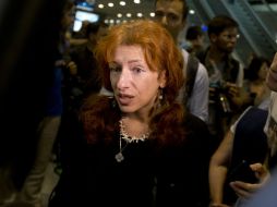 La alto mando de Human Rights Watch, Tatiana Lokshina, habla con la prensa en el aeropuerto de Sheremetyevo, previo al encuentro. AFP /