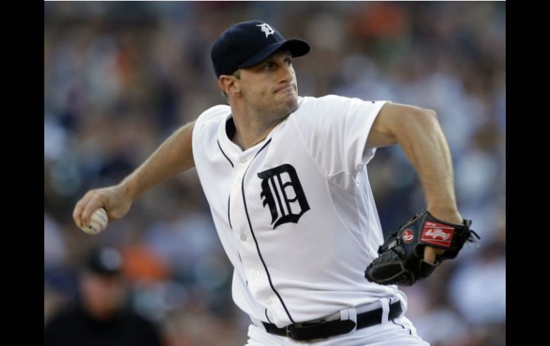 Cae en casa. Max Scherzer ejecuta un lanzamiento durante la cuarta entrada del juego efectuado en el Comerica Park. AP /