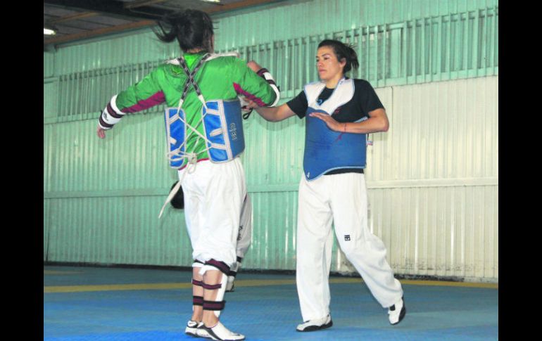 La sinaloense María del Rosario Espinoza (derecha), doble medallista olímpica, es la opción más viable para que México gane oro. MEXSPORT /