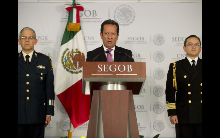 Eduardo Sánchez (c), vocero del gabinete de Seguridad, al momento de dar a conocer la detención del ''Z-40''. AFP /