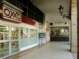 Directivos de Femsa aseguraron que cumplirán la meta de apertura de tiendas OXXO para 2013. ARCHIVO /