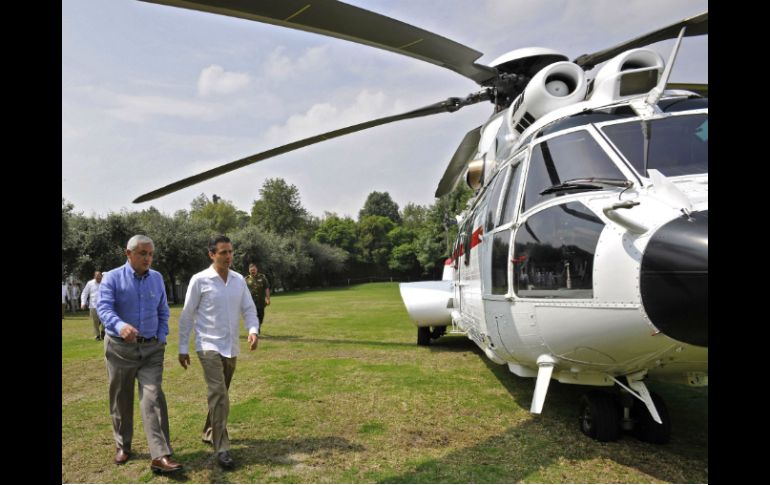 Peña y el mandatario de Guatemala viajaron por helicóptero a Guerrero. AFP /