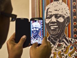 Mandela fue internado desde el pasado 8 de junio por una recaía de una infección pulmonar. AP /