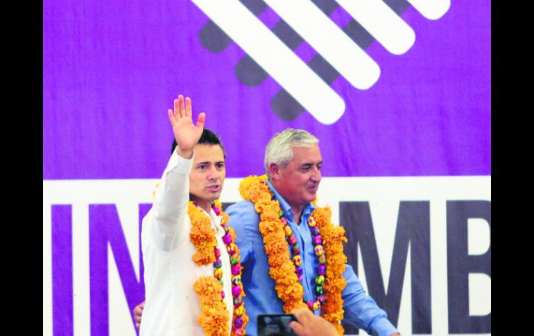 En el relanzamiento de la Cruzada contra el Hambre lo acompañó el presidente de Guatemala, Otto Pérez Molina. AFP /