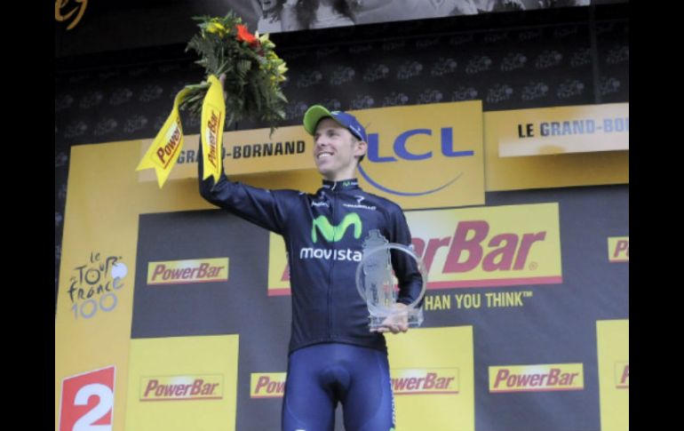 El ciclista portugués celebra en el podium su victoria tras disputar la 19ª etapa del Tour de Francia. EFE /