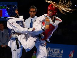 María del Rosario Espinoza (i) queda eliminada del Campeonato Mundial de Tae Kwon Do Puebla 2013. Foto: @CONADE ESPECIAL /