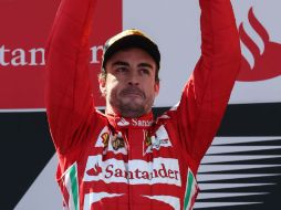 Fernando Alonso afirma que no basta con que hagan volver a la normalidad su auto, pues requiere ganar. ARCHIVO /