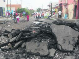 El aguacero que azotó Tonalá la tarde-noche del lunes destruyó la cinta asfáltica en algunas calles, como la Emiliano Zapata (foto). EL INFORMADOR /