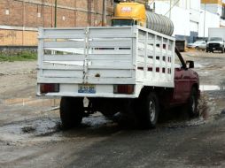 En lo que va de 2013, en Zapopan se han reportado mil 968 baches. ARCHIVO /