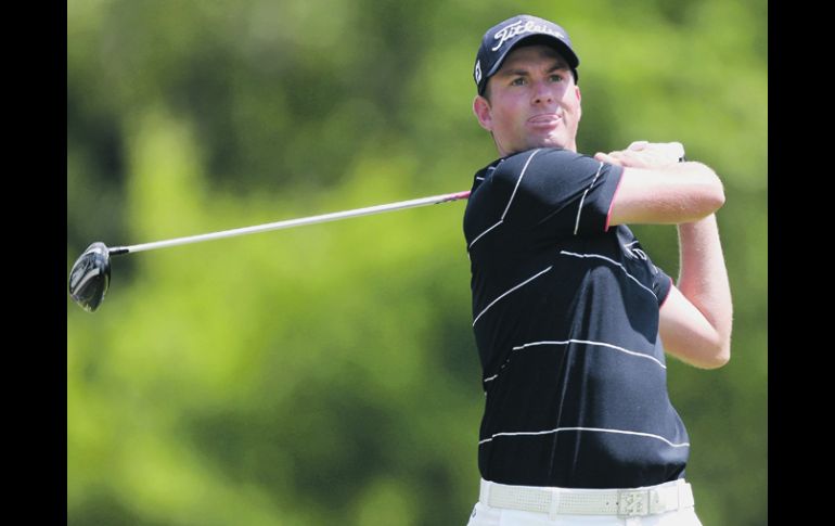 El estadounidense Webb Simpson marcha al frente en el Firestone Country Club de Akron, Ohio tras lograr seis birdies. AFP /