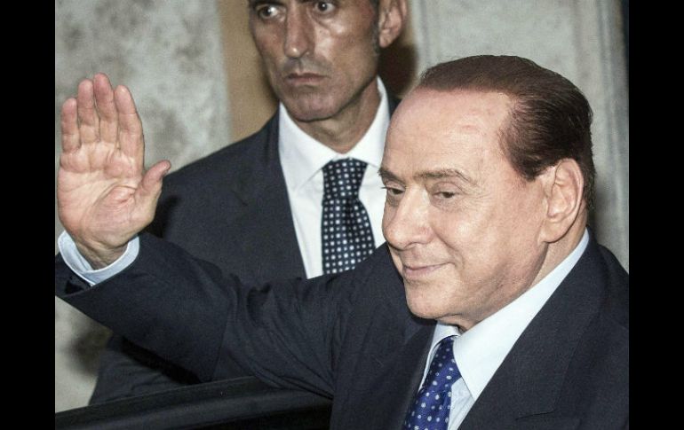 Silvio Berlusconi al salir de una reunión con los parlamentarios de su partido en la Cámara de Diputados. EFE /