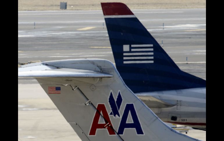 La nueva empresa tomará el nombre de American Airlines. AP /