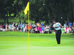 Uno arriba. Tiger Woods finalizó la primera ronda con una tarjeta de 71 golpes, uno sobre el par de campo. AFP /