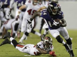 Marlon Brown de los Cuervos de Baltimore en el partido de ayer ante los Bucaneros de Tampa Bay. AP /