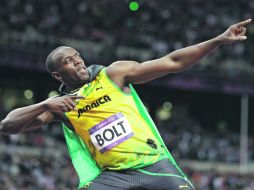 Usain Bolt busca tres medallas para convertirse en el más laureado en la historia de los Mundiales. AP /