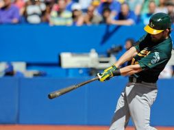 Josh Reddick conectó dos jonrones, pero no fue suficiente para evitar la derrota de su equipo ante los Azulejos de Toronto. AFP /