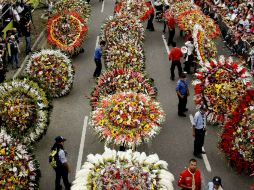 El origen de esta tradición se remonta al siglo XIX, cuando los campesinos cargaban en sus espaldas a los enfermos. EFE /