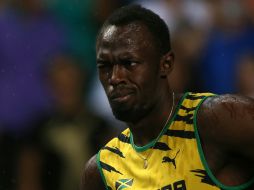 Usain Bolt disfruta su victoria en los 100 metros en la pista del Estadio Luzhniki. AFP /