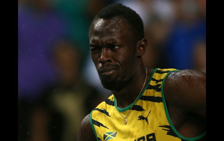 Usain Bolt disfruta su victoria en los 100 metros en la pista del Estadio Luzhniki. AFP /