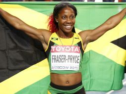 Shelly-Ann Fraser-Pryce arrasa con la competencia, ganando su segundo campeonato mundial en los 100 metros. AFP /