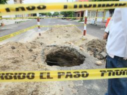 Los socavones pueden crearse por fugas de agua o carencias en la capacidad del drenaje.  /