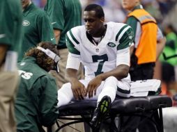 Geno Smith no ha podido recuperarse de la lesión de tobillo que sufrió durante la temporada regular. AP /