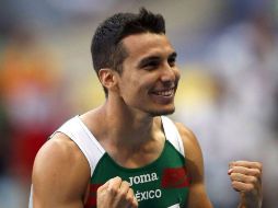 El Presidente reconoció el logro del mexicano Luis Rivera por su triunfo en el Mundial de Atletismo de Moscú 2013. EFE /