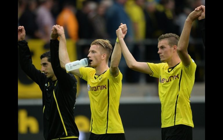 Marco Reus y sus compañeros celebran la victoria ante el recién ascendido Eintracht Braunschweig. AFP /