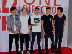 One Direction escogió imágenes simpáticas y anécdotas viajeras, conciertos y grabación de canciones, para el documental. AP /